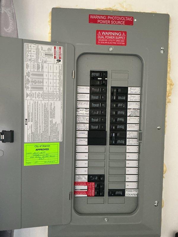 Conducted on-site assessment for air conditioning system replacement. Existing 10+ year old AC unit was non-operational and found to be empty of R410A refrigerant. Evaluated basement-mounted evaporator coil installation connected to existing natural gas furnace system. Inspected ductwork configuration, plenum connections, and electrical service panel with dual power supply for solar integration. Documented equipment specifications and provided replacement estimate for complete AC system compatible with current infrastructure.