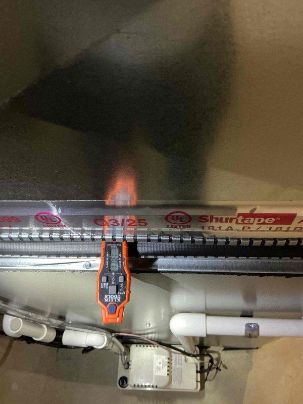 Completed installation of 70,000 BTU furnace with 180-degree rotation configuration, 600 CFM airflow capacity, and 4x25 venting system. Installed humidifier and liner as part of the mechanical system upgrade, with all work performed under mechanical permit. Applied for utility rebate upon completion, and documented installation with photographs showing proper venting configuration and PVC drainage routing through basement ceiling joists.