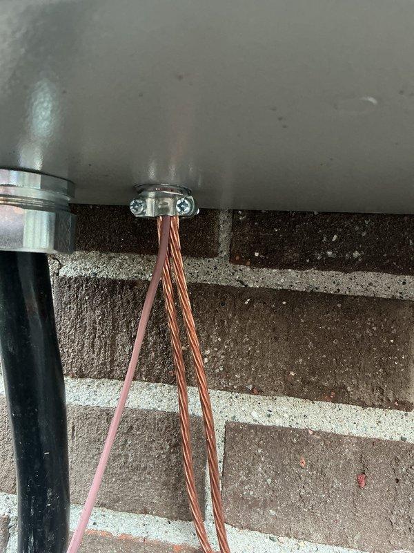 Responded to no-cool call on 2-year-old AC system that stopped operating following recent Generac generator installation. Upon arrival, found both furnace and AC inoperative. Inspected electrical connections at generator transfer switch and discovered improper wiring configuration affecting HVAC system power supply. Verified generator transfer switch installation had interrupted proper electrical feed to heating and cooling equipment. Traced wiring from Generac control module through terminal blocks and confirmed multiple circuits were improperly configured on AC circuit distribution. Corrected electrical connections at transfer switch to restore proper power routing to HVAC systems. Verified proper voltage supply restored to both furnace and air conditioning unit. Cycled systems through startup sequence and confirmed both units operational. Performed requested AC tune-up including filter inspection, refrigerant charge verification, and airflow assessment. System now functioning proper