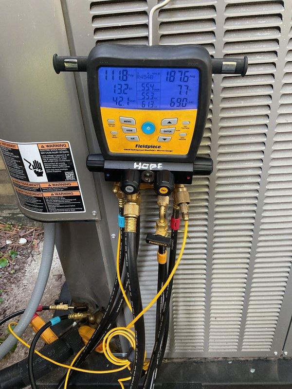 Performed system start-up on newly installed basement evaporator coil and corresponding outdoor condensing unit. Connected digital manifold gauges to service ports and verified refrigerant pressures and temperatures across the system, confirming proper charge levels and system operation. Inspected electrical connections within outdoor unit junction box, including capacitor, contactor, and associated wiring, ensuring all components were properly secured and functioning correctly for safe system operation.