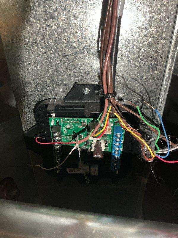 Responded to service call for 8-month-old HVAC system where air conditioning unit required unplugging to allow furnace operation. Inspected basement-located evaporator coil and air handler electrical components. Diagnosed control board wiring conflict between heating and cooling systems causing operational interference. Verified all wire connections on control boards, checked refrigerant line connections, and inspected condensate pump with operational LED indicators. Resolved electrical control issue allowing simultaneous proper operation of both heating and cooling systems without requiring manual disconnection.