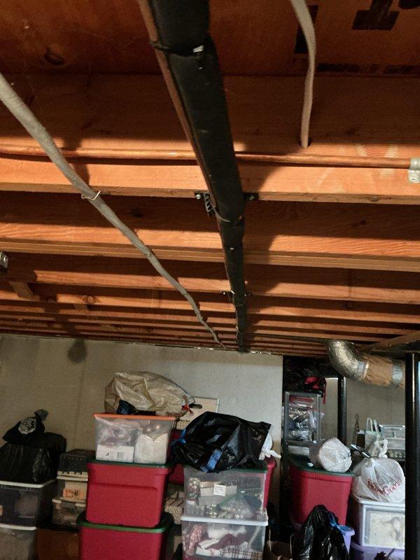 Performed AC inspection on 12-year-old outdoor unit as part of gold maintenance plan. System found to be low on refrigerant, indicating a potential leak in the system. Provided estimate for AC replacement given the age of the unit and refrigerant loss. Evaluated furnace filter and humidifier filter condition in basement mechanical room per customer request and advised on replacement needs.