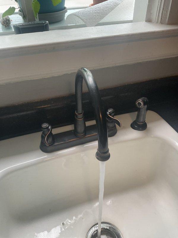 Relocated existing hose spigot and installed new frost-free hose bib on exterior wall with proper mounting and weatherproofing. Removed two saddle taps and replaced with code-compliant icemaker stops to improve water supply reliability. Replaced pop-up assembly with chrome finish unit on pedestal sink, installed new aerator on kitchen faucet to restore proper water flow, and secured loose shower head without wall penetration.