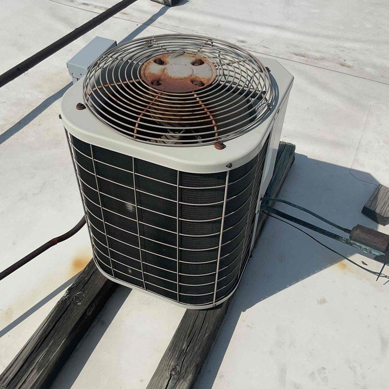 Completed commercial HVAC maintenance agreement inspection on six units consisting of three rooftop units and three split systems located on the roof and front office ceiling areas. Performed comprehensive preventive maintenance checks on all equipment, inspected and documented air filtration systems with pleated media filters, and evaluated outdoor condenser units including fan assemblies and electrical disconnects. All units were accessible via ladder, and routine maintenance was completed during facility operating hours of 6:00 AM to 4:00 PM.