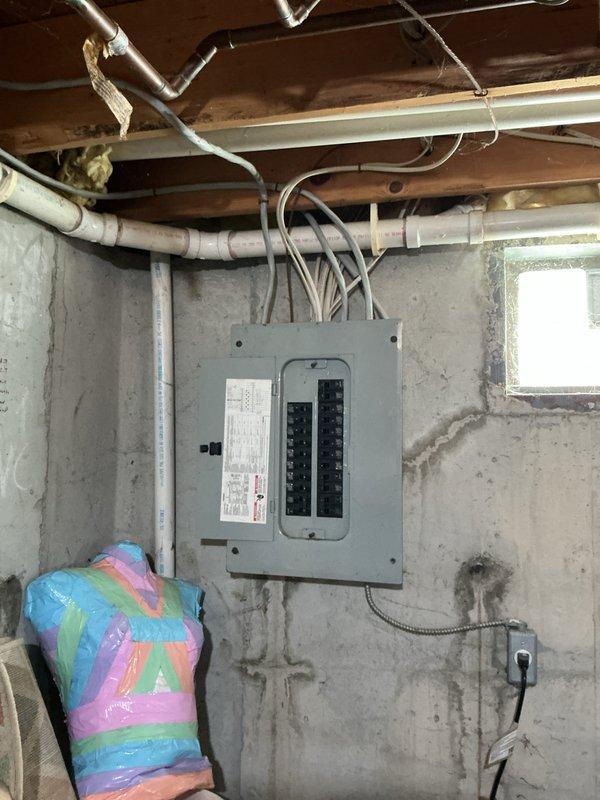 Completed comprehensive estimate for full HVAC system replacement on 25-year-old furnace and air conditioning units located in basement and exterior of property. Primary concern identified was cracked heat exchanger in existing furnace, which poses safety hazard and requires immediate replacement. Conducted thorough inspection of both heating and cooling systems, evaluated humidifier functionality, assessed thermostat operation, and inspected hot water tank as part of complete system evaluation. Documented existing installation conditions including ductwork configuration, electrical panel connections, and equipment placement in unfinished basement utility area. Provided detailed replacement quote for new furnace and air conditioner system to address failed heat exchanger and aging equipment that has exceeded expected service life.