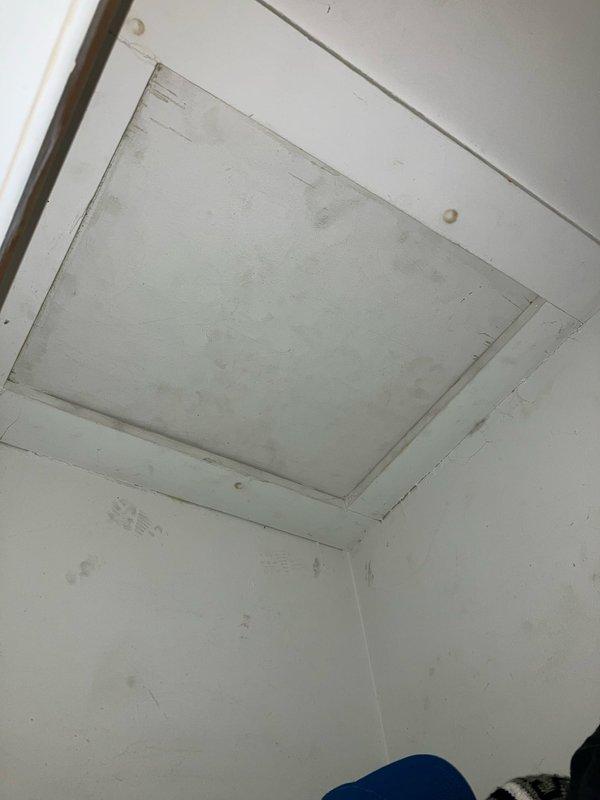 Conducted site assessment for non-operational air conditioning system located in attic space. Evaluated existing equipment condition, verified electrical service connection at exterior meter, and inspected attic access point to provide comprehensive replacement estimate for new AC unit installation.