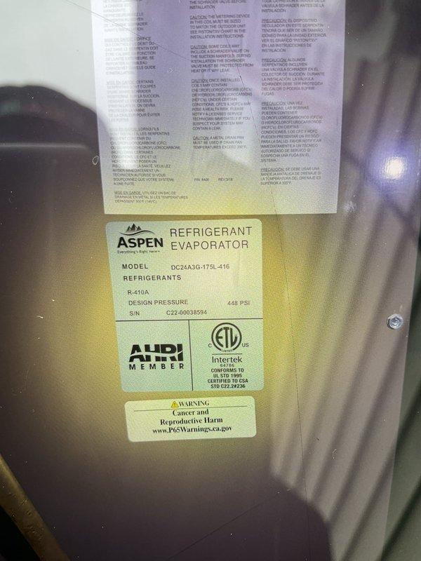 Completed NSP AC inspection on 3-year-old system with basement coil and furnace. Verified operation of ASPEN refrigerant evaporator coil (Model DC24A3G-175L-416) containing R-410A refrigerant at 448 PSI design pressure. Inspected Honeywell Home air filter (Model FC100A1029, 16x25x4, MERV 11 rating) and provided customer education regarding proper filter maintenance intervals and MERV rating specifications for optimal system performance and air quality.