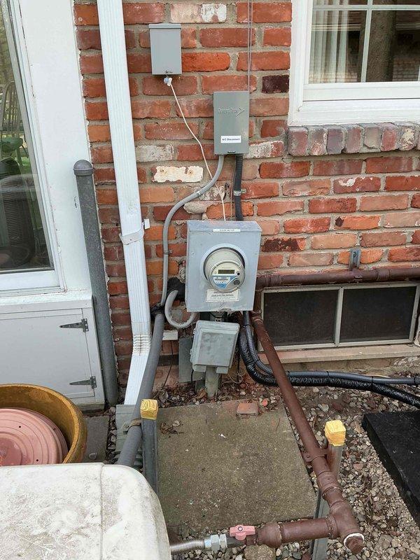 Completed full HVAC system installation including 110,000 BTU furnace, 4-ton air conditioning unit positioned on left side of property, humidifier, and thermostat. Obtained mechanical, plumbing, and electrical permits prior to installation. Reconnected existing electrical service and performed system commissioning with refrigerant manifold gauges showing proper subcooling at 10.6°F and superheat readings within manufacturer specifications at 8.14°F. System pressures verified at 222.7 PSIG on high side. Registered installation under AHRI certificate 216722654 and submitted documentation for applicable utility rebate programs.