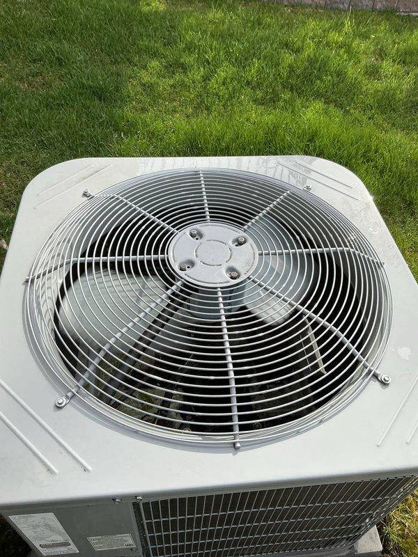 Completed comprehensive Gold AC inspection on 6-year-old residential split system with outdoor condenser unit and basement air handler. Performed thorough evaluation of all system components, including visual inspection of condenser unit showing clean, well-maintained exterior condition with properly functioning fan assembly and intact protective grilles over heat exchanger coils. Inspected indoor air handler and associated ductwork in basement location, verifying proper installation of refrigerant lines and condensate drainage system routed through attic space. System confirmed operational at time of inspection with no immediate service needs identified.