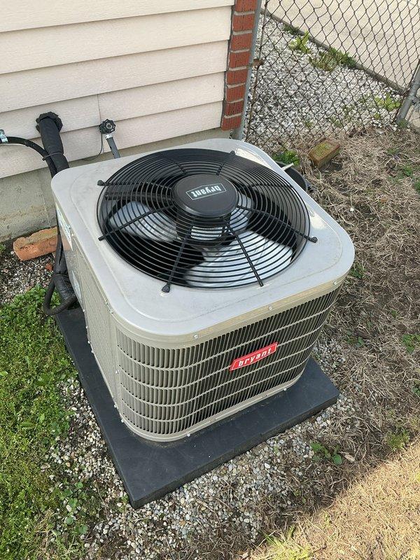 Completed comprehensive Gold AC inspection on 4-5 year old Bryant residential split system with air handler located in basement. Performed full system evaluation including visual inspection of outdoor condenser unit, verified proper operation of compressor and condenser fan, checked refrigerant lines and electrical connections, and assessed overall equipment condition. Unit found operating within normal parameters with no immediate service needs identified. Advised customer to maintain clear area around condenser unit, removing any debris and animal waste to ensure proper airflow and system efficiency.