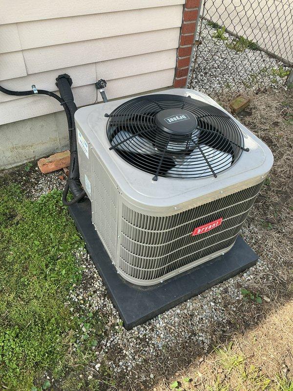 Completed comprehensive Gold AC inspection on 4-5 year old Bryant residential split system with air handler located in basement. Performed full system evaluation including visual inspection of outdoor condenser unit, verified proper operation of compressor and condenser fan, checked refrigerant lines and electrical connections, and assessed overall equipment condition. Unit found operating within normal parameters with no immediate service needs identified. Advised customer to maintain clear area around condenser unit, removing any debris and animal waste to ensure proper airflow and system efficiency.