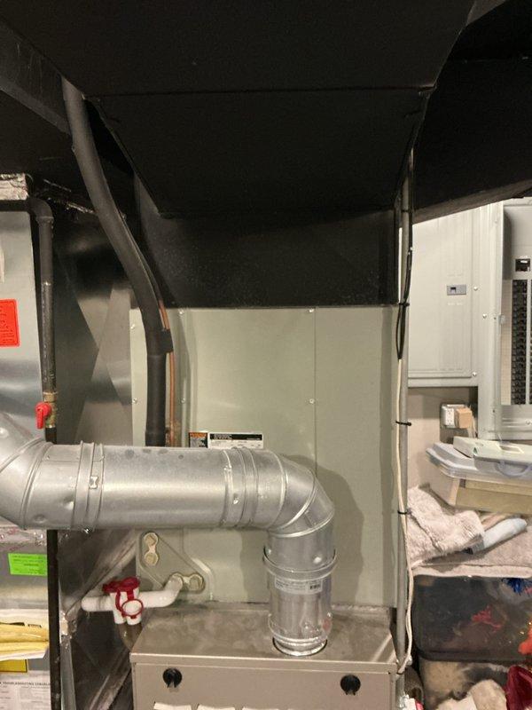 Completed comprehensive HVAC system inspection and replacement estimate for a 24-year-old air conditioning system utilizing R22 refrigerant. The existing equipment, located in the basement mechanical room, was evaluated for age-related inefficiency and obsolete refrigerant technology. Documented current system configuration including air handler unit, ductwork connections, and electrical service panel to support replacement recommendations for upgraded, environmentally compliant cooling equipment.
