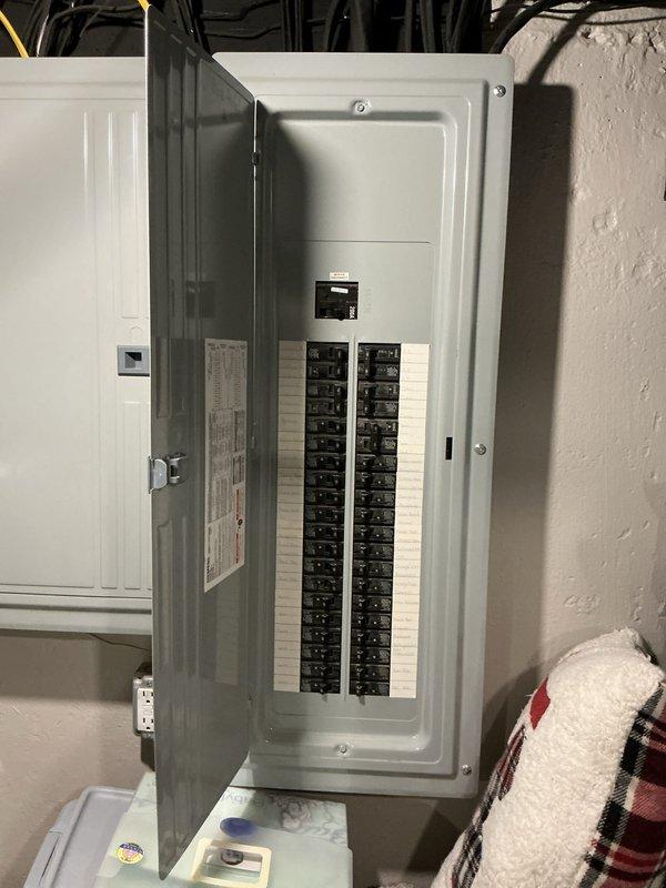 Completed comprehensive HVAC system inspection and replacement estimate for a 24-year-old air conditioning system utilizing R22 refrigerant. The existing equipment, located in the basement mechanical room, was evaluated for age-related inefficiency and obsolete refrigerant technology. Documented current system configuration including air handler unit, ductwork connections, and electrical service panel to support replacement recommendations for upgraded, environmentally compliant cooling equipment.