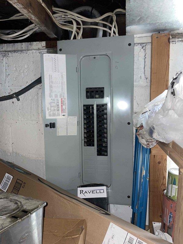 Conducted comprehensive site assessment for full HVAC system replacement including central air conditioning installation, furnace replacement, and water heater replacement. Evaluated existing electrical panel capacity and circuit breaker configuration to ensure adequate power supply for new equipment installation. Inspected basement utility area including current furnace unit, ductwork routing, and available space for equipment placement. Documented existing infrastructure conditions including electrical wiring, structural supports, and mechanical room layout. Photographed electrical panel, existing HVAC equipment, and installation area to support estimate preparation for complete system upgrade.