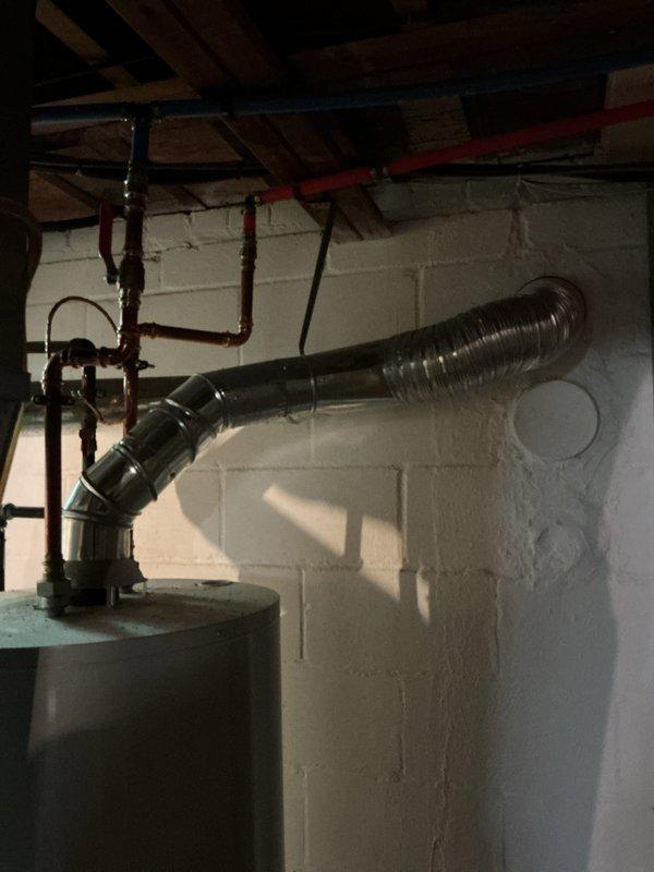 Conducted comprehensive assessment of aging residential HVAC system consisting of Luxaire furnace and air conditioning unit located in basement. Existing equipment approximately 27-28 years old and homeowner seeking replacement due to age and reliability concerns. Performed thorough inspection of current furnace, ductwork configuration, venting system, and air conditioning components. Evaluated existing galvanized metal ductwork with insulation wrapping, vertical venting, and flexible conduit connections. Documented equipment specifications, spatial constraints, and mechanical room layout including proximity to water heater and existing utility infrastructure. Provided detailed replacement estimate for complete system upgrade including new furnace and air conditioning equipment with appropriate sizing recommendations based on current installation configuration and home requirements.