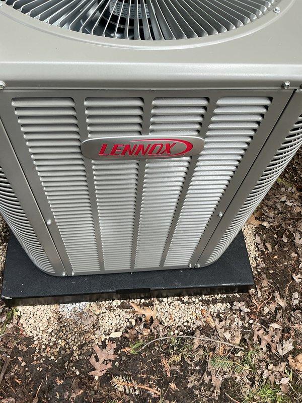 Completed full installation of 2-ton air conditioning system including outdoor Lennox condenser unit and indoor evaporator coil. Installed condenser in rear yard location on composite pad with proper gravel base, connected refrigerant lines to indoor air handler unit in basement, and completed all electrical connections. Verified proper refrigerant charge, tested system operation, and confirmed cooling functionality throughout entire system.