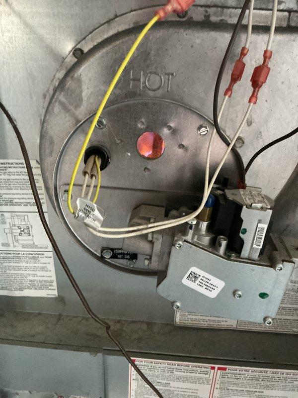 Completed comprehensive NSP furnace and air conditioning inspection on 2019 system located in laundry room. Inspected burner assembly, heat exchanger, gas valve controls, electrical connections, and safety devices; all components found operating within normal parameters with no deficiencies noted.