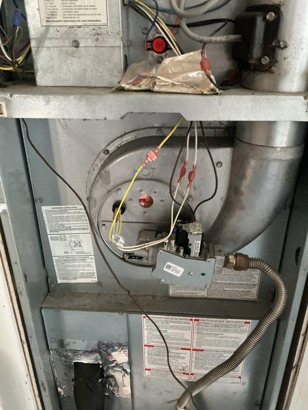 Completed comprehensive NSP furnace and air conditioning inspection on 2019 system located in laundry room. Inspected burner assembly, heat exchanger, gas valve controls, electrical connections, and safety devices; all components found operating within normal parameters with no deficiencies noted.