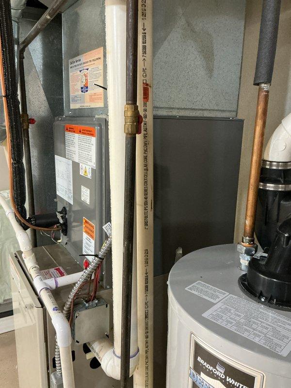Responded to no-heat call on 23-year-old Bryant furnace located in basement. Upon inspection, confirmed unit was shut down for safety due to compromised heat exchanger exhibiting orange flaking and corrosion, previously identified after high limit and rollout switch replacements by another contractor. Documented existing HVAC system configuration including furnace, ductwork, and water heater setup. Provided comprehensive replacement estimate for furnace only, as existing air conditioning system is newer and operational.