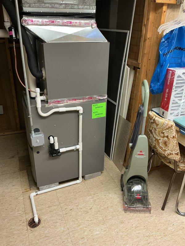 Responded to reported intermittent gas odor in residence with unclear source. Performed comprehensive gas leak inspection of basement mechanical room, including thorough examination of 5-year-old water heater and Lennox furnace system. Conducted combustible gas detection testing at all gas appliances, connections, and supply lines. Inspected furnace burner assembly, heat exchanger, and venting system for proper operation and integrity. Evaluated water heater flue pipe, gas valve, and burner compartment. Verified proper ventilation and combustion air supply in mechanical room. All gas connections tested negative for leaks, appliances operating within normal parameters. Documented equipment condition with photographs for record. No active gas leaks detected during service visit; both heating systems functioning properly with adequate venting.