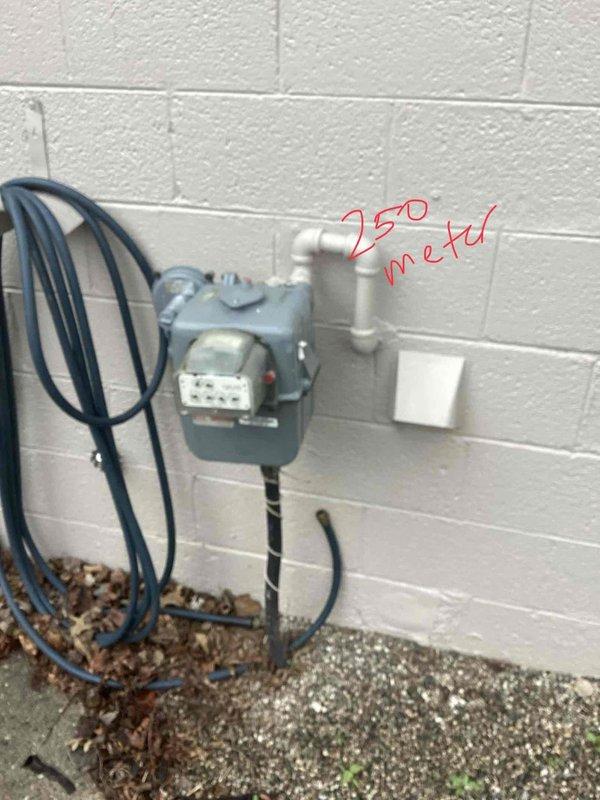 Completed estimate for mini split installation requiring gas line extension to second floor. Assessed existing gas meter location and mapped routing path along exterior wall up approximately 25 feet to second-floor penetration point. Proposed installation includes running new gas piping from existing meter through exterior wall-mounted route with appropriate supports and code-compliant fittings to supply future mini split equipment on upper level.