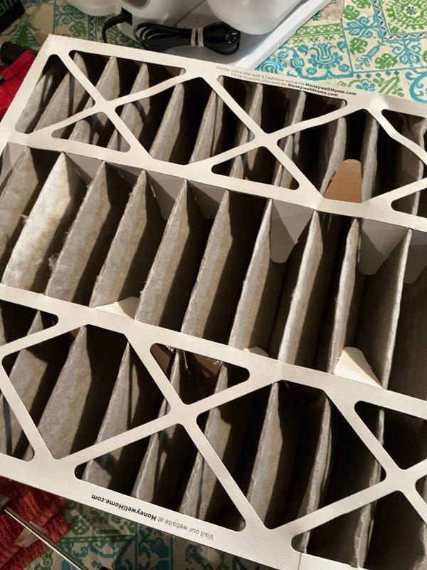 Completed comprehensive Gold Furnace Inspection on 9-year-old forced air system located in basement of multi-unit residential property. Performed combustion analysis using Testo 310 analyzer, which confirmed safe operation with 0 ppm carbon monoxide readings. Inspected and evaluated existing air filtration system, documenting filter condition with photographic evidence showing clean pleated MERV-rated filters in proper working condition. All equipment found to be operational at time of inspection with no immediate safety concerns or required repairs identified.