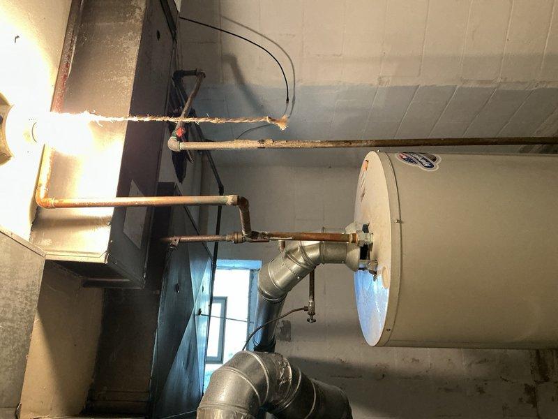 Completed comprehensive Gold AC Inspection on basement-located air handler unit under 10 years of age. Performed thorough system evaluation including visual inspection of air handler, refrigerant lines, condensate drainage system, electrical connections, and associated components. Documented equipment condition with photographic evidence showing proper installation of PVC condensate drain lines secured with appropriate fasteners, copper refrigerant lines with insulation intact, and control wiring in satisfactory condition. Verified air handler operational status, inspected all accessible components for wear or deterioration, and confirmed proper condensate drainage routing. System found to be functioning within normal parameters with no immediate service needs identified during this preventive maintenance inspection.