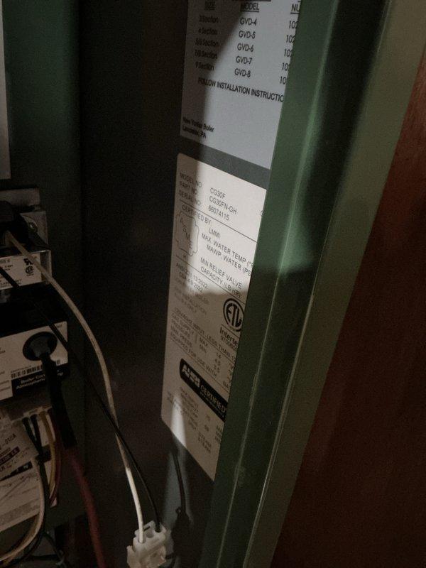 Successfully completed installation of new boiler system and 40-gallon hot water heater in mechanical room. Installed Lancaster-manufactured boiler unit (Model CG35F) with A+ energy rating, including proper placement of pressure relief valve and all required safety components. Connected new thermostat to boiler system and completed all mechanical reconnections per code requirements. All equipment properly labeled with manufacturer specifications and certification marks, system tested and operational.