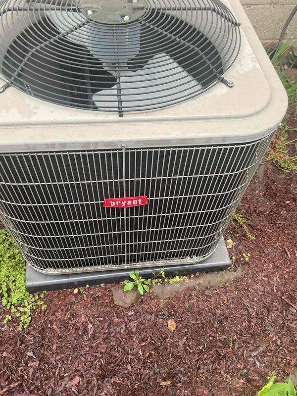 Completed comprehensive Gold AC inspection on 5-year-old Bryant air conditioning system with air handler located in basement. Performed thorough evaluation of outdoor condenser unit, including visual inspection of electrical components, capacitor, wiring connections, and fan assembly. Unit found to be in operational condition with normal weathering for age; all electrical connections secure and components functioning properly within manufacturer specifications.