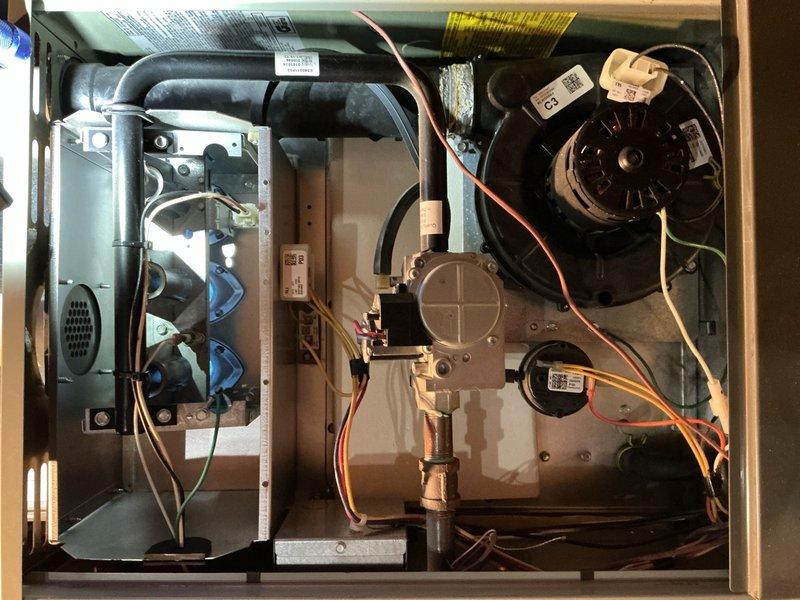 Completed comprehensive late season tune-up on 10+ year old furnace system located in basement. Performed thorough inspection of gas furnace components including burner assembly, heat exchanger, gas valve, draft inducer motor, and blower assembly. Checked and verified proper operation of flame sensors, igniter, and electrical connections throughout the unit. Inspected associated systems including humidifier, thermostat, and hot water tank as part of seasonal maintenance package. All components found operating within normal parameters; system returned to service in good working condition.
