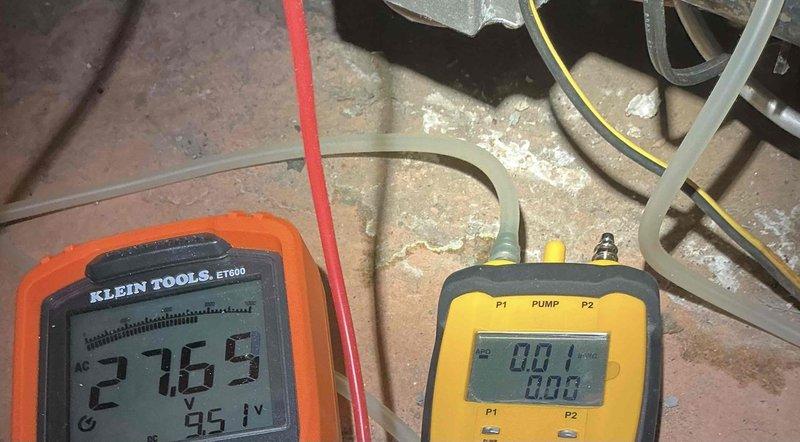 Completed comprehensive Gold Boiler Inspection on 23-year-old residential boiler system located in basement. Performed thorough visual inspection of heat exchanger, burner assembly, and all major components. Utilized multimeter to verify electrical readings at 27.69 volts and dual-port pressure gauge to measure system pressures, confirming operational parameters within acceptable range. Inspected heat exchanger tubes for signs of corrosion, cracking, or deterioration. Examined venting system and ductwork connections for proper installation and integrity. All safety controls and limit switches tested and verified functional. Unit confirmed operational at time of inspection with no immediate service requirements identified.