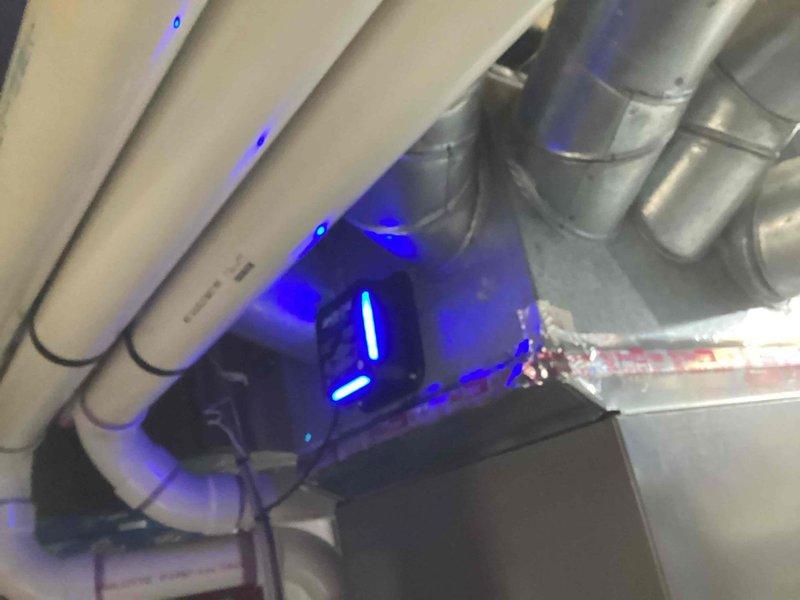 Responded to callback for heating fault on 8-year-old ceiling-mounted furnace unit. Accessed equipment in attic space using ladder and inspected electrical components including relay and control board connections. Diagnosed and addressed heating system malfunction, verified proper operation of air handler with blue LED status indicators, and confirmed all electrical connections and ductwork were secure and functioning correctly.