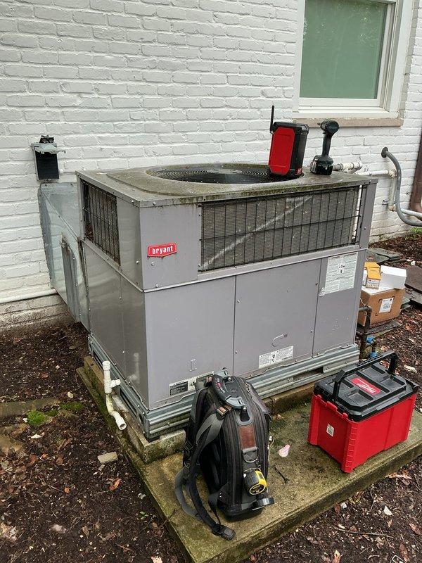 Responded to service call for Bryant packaged HVAC unit. Upon inspection, diagnosed system requiring repair components. Ordered necessary parts under purchase order 1311323-001 at BY Warren for installation. Documented equipment condition and piping connections including refrigerant lines, drainage system, and service valves. Unit currently awaiting parts delivery to complete repair and restore system to full operational status.