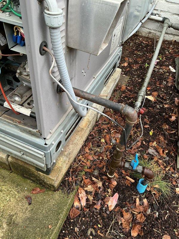 Responded to service call for Bryant packaged HVAC unit. Upon inspection, diagnosed system requiring repair components. Ordered necessary parts under purchase order 1311323-001 at BY Warren for installation. Documented equipment condition and piping connections including refrigerant lines, drainage system, and service valves. Unit currently awaiting parts delivery to complete repair and restore system to full operational status.