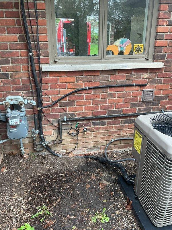 Replaced exterior hose bib (frost-free sillcock) mounted on brick foundation due to worn valve mechanism and deteriorated internal components. Removed old fixture, verified proper drainage slope, and installed new brass frost-free valve with anti-siphon protection to prevent freeze damage and ensure code compliance.