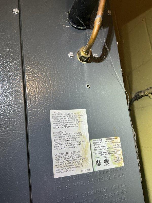 Completed comprehensive Gold AC inspection on single-unit Goodman HVAC system with air handler located in first-floor mudroom. Performed full system evaluation including condenser unit inspection, verified proper operation of all components, checked refrigerant lines and connections, inspected air handler cabinet and coil assembly, and documented equipment specifications and serial numbers. System confirmed operational with all components functioning within normal parameters; no service issues identified at time of inspection.