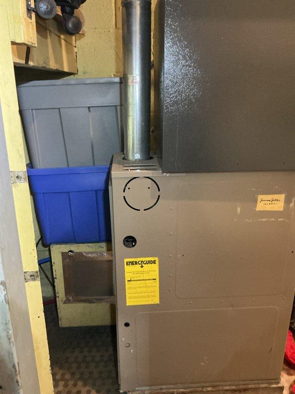 Completed comprehensive Gold AC inspection on single-unit Goodman HVAC system with air handler located in first-floor mudroom. Performed full system evaluation including condenser unit inspection, verified proper operation of all components, checked refrigerant lines and connections, inspected air handler cabinet and coil assembly, and documented equipment specifications and serial numbers. System confirmed operational with all components functioning within normal parameters; no service issues identified at time of inspection.