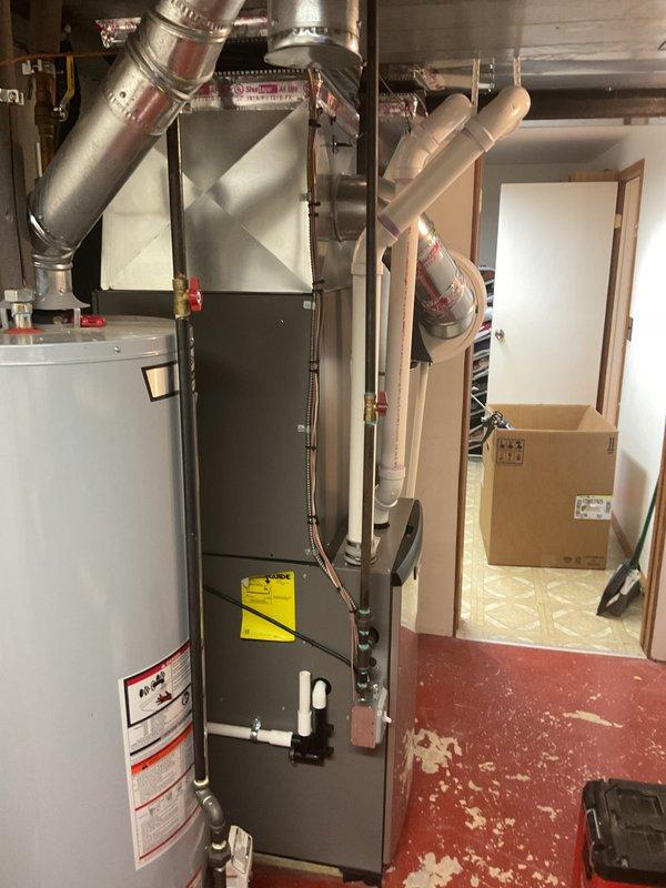 Completed full HVAC system installation including a 90,000 BTU high-efficiency furnace and 3-ton air conditioning unit configured for left-side placement. Installed all ductwork connections, gas valve assembly, electrical wiring, and refrigerant lines, then reconnected existing utility connections and verified proper operation of all components. Mechanical permit was requested and utility rebate documentation was processed for the customer.