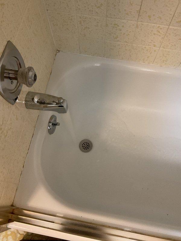 Responded to service call for clogged bathtub drain. Upon arrival, assessed the bathroom plumbing fixtures and confirmed slow drainage in the bathtub. Successfully cleared the obstruction from the tub drain using appropriate drain cleaning equipment, restoring proper water flow and drainage function. Tested the system to verify complete resolution of the blockage and confirmed all fixtures were operating normally upon completion.