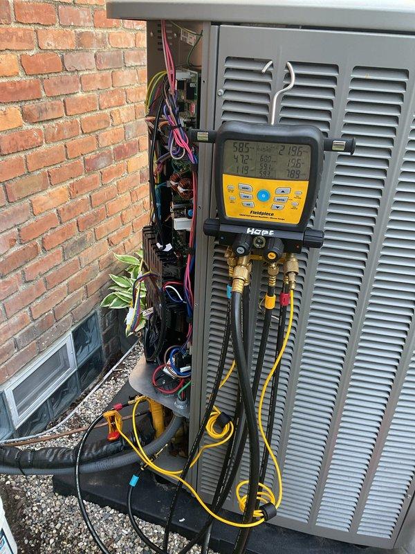 Completed system start-up on outdoor HVAC unit following TXV replacement. Connected digital diagnostic meter and refrigerant gauges to verify proper system operation and charging. Confirmed all electrical connections, tested system performance parameters, and verified condensate drain line installation. Unit operating within manufacturer specifications with proper refrigerant levels and airflow.