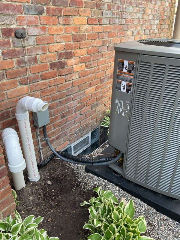 Completed system start-up on outdoor HVAC unit following TXV replacement. Connected digital diagnostic meter and refrigerant gauges to verify proper system operation and charging. Confirmed all electrical connections, tested system performance parameters, and verified condensate drain line installation. Unit operating within manufacturer specifications with proper refrigerant levels and airflow.