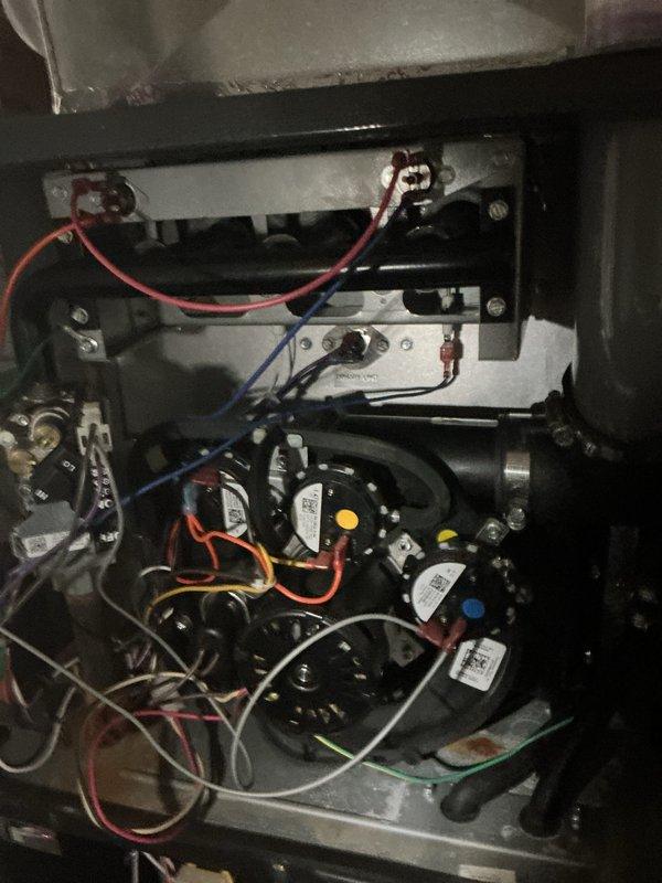 Completed NSP AC inspection on residential property with 10+ year old outdoor condenser unit and 4-year-old furnace located in basement. Performed comprehensive system evaluation including visual inspection of indoor furnace components, control board, electrical connections, and blower assembly. Inspected outdoor condenser unit, verified fan operation, checked refrigerant lines, and assessed overall equipment condition. All components found operating within normal parameters. System deemed functional with no immediate repairs required at time of inspection.