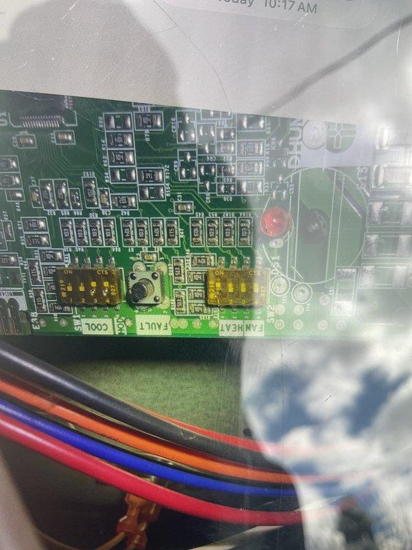 Completed comprehensive Gold AC inspection on residential air conditioning system. Performed thorough examination of outdoor condenser unit, verifying proper placement, clearances, and external condition. Inspected control board and electrical components inside unit, checking all connections, circuit integrity, and safety devices including fault indicators and DIP switch configurations. All wiring connections were verified secure with proper color coding intact. Documented system condition through photographic records. Unit operating within normal parameters with no immediate concerns identified.