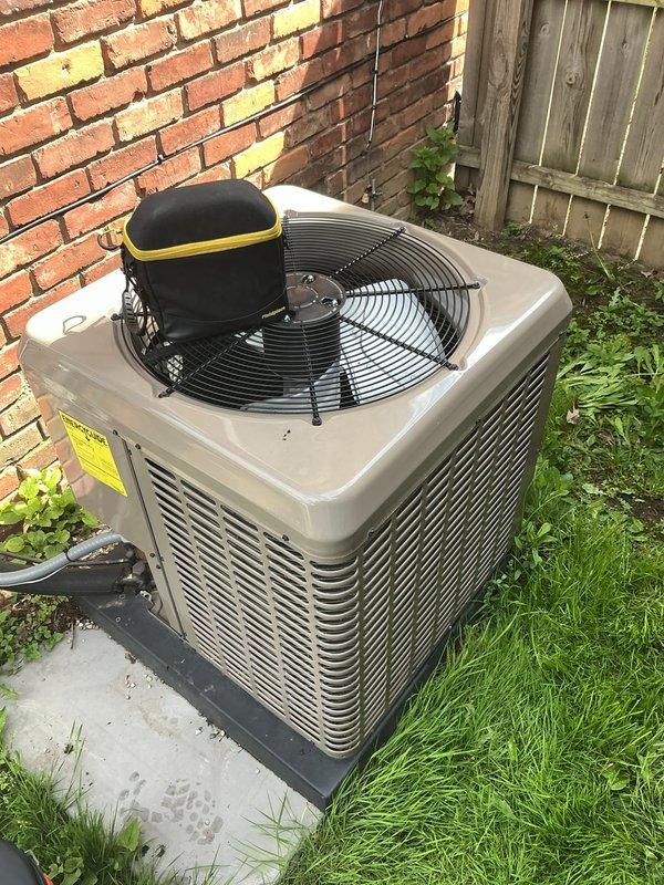 Completed comprehensive Gold AC inspection on 4-year-old York residential air conditioning system with outdoor condensing unit and basement air handler. Performed full system diagnostics and operational testing on properly functioning single-zone cooling system. Conducted thorough visual inspection of outdoor condenser unit positioned on concrete pad, verified proper installation clearances, checked refrigerant line insulation along exterior wall, and assessed overall equipment condition. All components operating within manufacturer specifications with no immediate service needs identified.