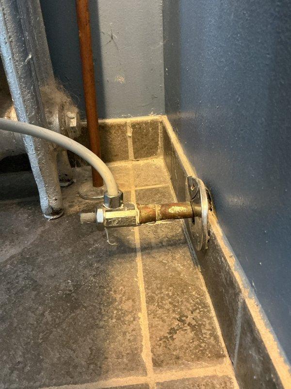 Completed plumbing repairs at residential property including replacement of a corroded 1/2" IP angle toilet stop valve in the second floor main bathroom. Replaced a faulty Kohler GP876851 cartridge in the master bathroom faucet to restore proper water flow and temperature control. Removed and reinstalled shower head in the second floor main bathroom to address fixture issues. Installed three frost-free vacuum breakers on exterior hose spigots to provide backflow prevention and freeze protection for outdoor water connections.
