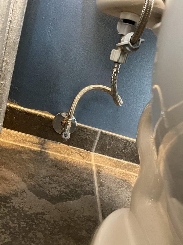 Completed plumbing repairs at residential property including replacement of a corroded 1/2" IP angle toilet stop valve in the second floor main bathroom. Replaced a faulty Kohler GP876851 cartridge in the master bathroom faucet to restore proper water flow and temperature control. Removed and reinstalled shower head in the second floor main bathroom to address fixture issues. Installed three frost-free vacuum breakers on exterior hose spigots to provide backflow prevention and freeze protection for outdoor water connections.