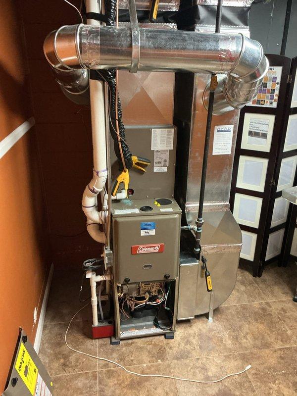 # HVAC Maintenance - Gold AC Inspection

Completed comprehensive Gold AC inspection on dual-unit residential HVAC system consisting of one 17-year-old unit and one 2-year-old unit with basement-located coils. Performed thorough system evaluation of Coleman furnace and air handler assembly, inspected ductwork configuration and refrigerant line insulation integrity, and verified electrical connections and control panel operation. Utilized Fieldpiece SC680 multimeter to measure system performance parameters, confirming both units are operational and functioning within manufacturer specifications.