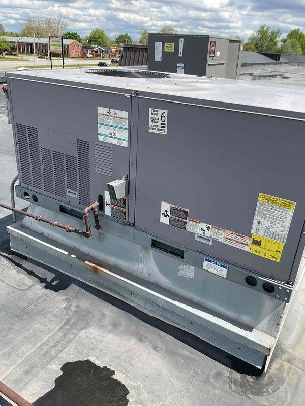 Completed spring maintenance on two commercial rooftop units as part of scheduled preventive maintenance agreement. Accessed RTU equipment via ladder, performed comprehensive system inspection including refrigerant lines, electrical connections, and operational controls. Replaced dirty GlasFloss air filters on both units to restore proper airflow and system efficiency. Verified all safety labels present, checked refrigerant line integrity, and confirmed units operating within normal parameters upon completion.