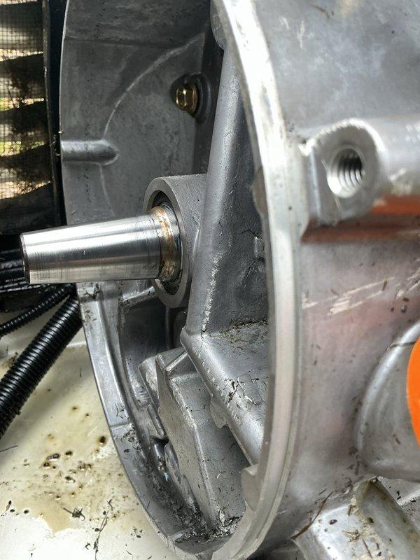 Replaced crankshaft seal on generator engine to eliminate oil leakage. Engine was transported to shop for repair work, with replacement seals and oil pressure switch ordered and installed upon arrival. Work completed successfully to prevent further oil loss and ensure proper engine operation.