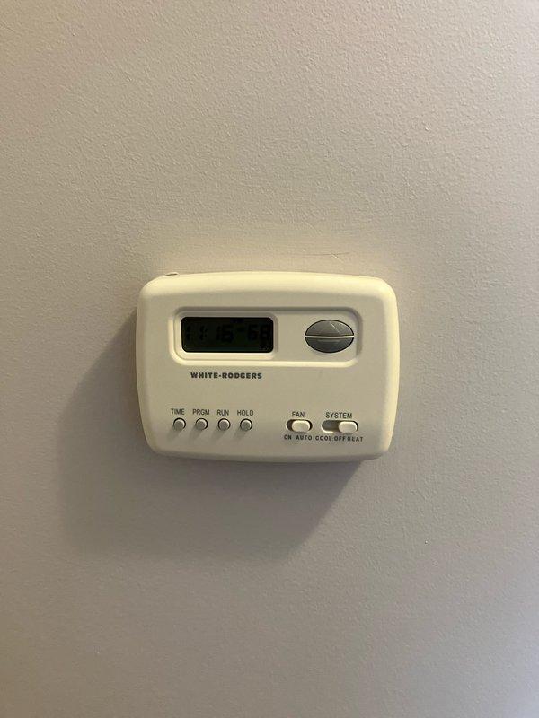 Completed comprehensive estimate for replacement of 22-year-old furnace and air conditioning system located in basement. Evaluated existing White-Rodgers programmable thermostat, electrical panel configuration, and circuit breaker capacity to determine compatibility requirements for new HVAC equipment installation.